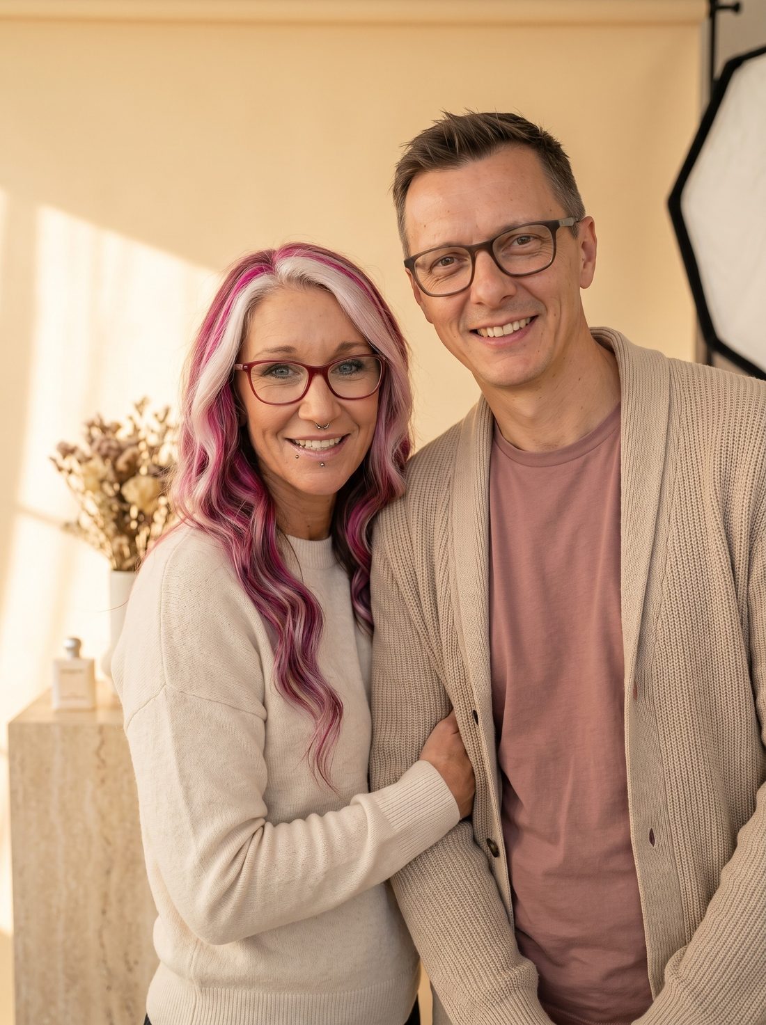 Mr and Mrs Digital, the husband-and-wife team behind the studio, as their AI avatars